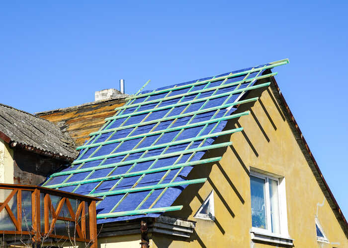 blue roofing battens on a roof blue roofing battens on a roof