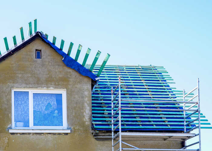 blue roofing battens with scaffolding blue roofing battens with scaffolding