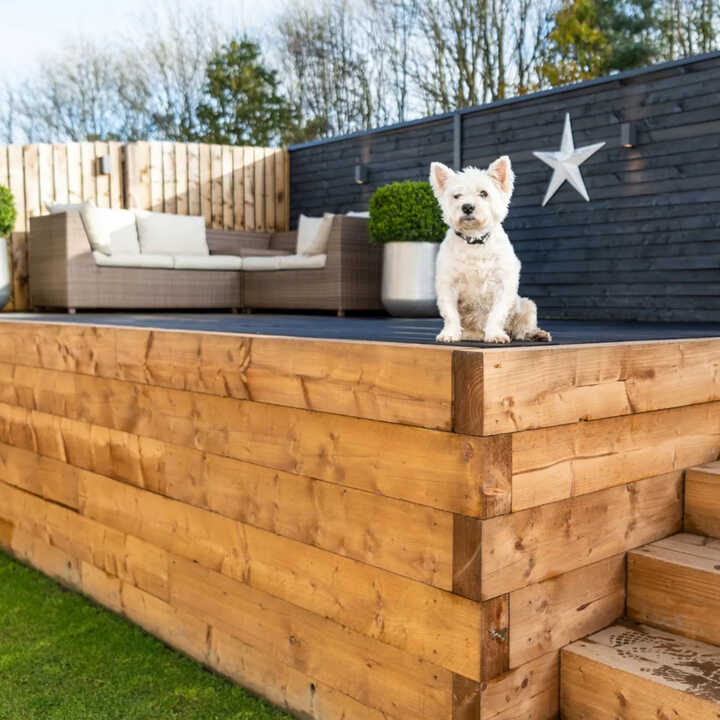 garden wall made from pressure treated timber sleepers