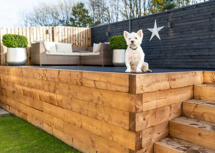 garden wall made from pressure treated timber sleepers