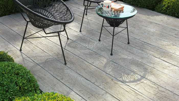 Garden furniture on driftwood decking