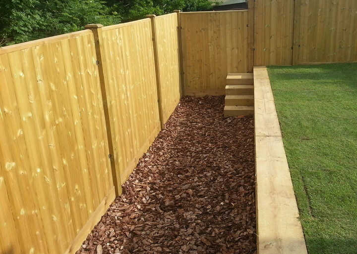 tongue and groove fence panel with concrete pillars