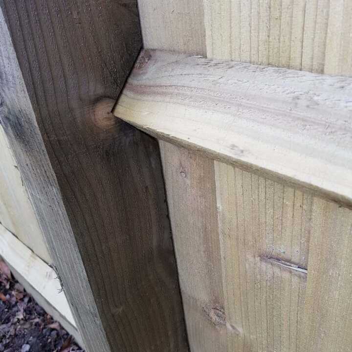 pressure treated notched timber post