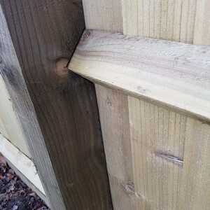pressure treated notched timber post