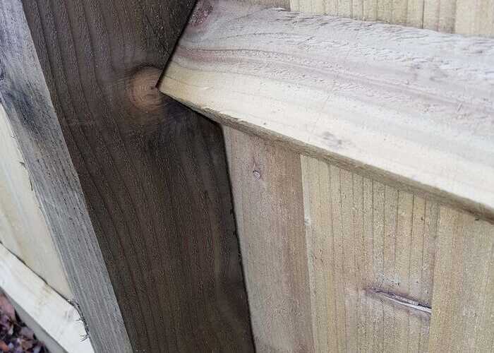 pressure treated notched timber post
