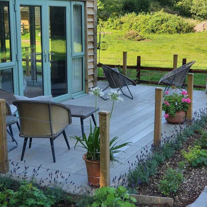 millboard decking with black garden furniture