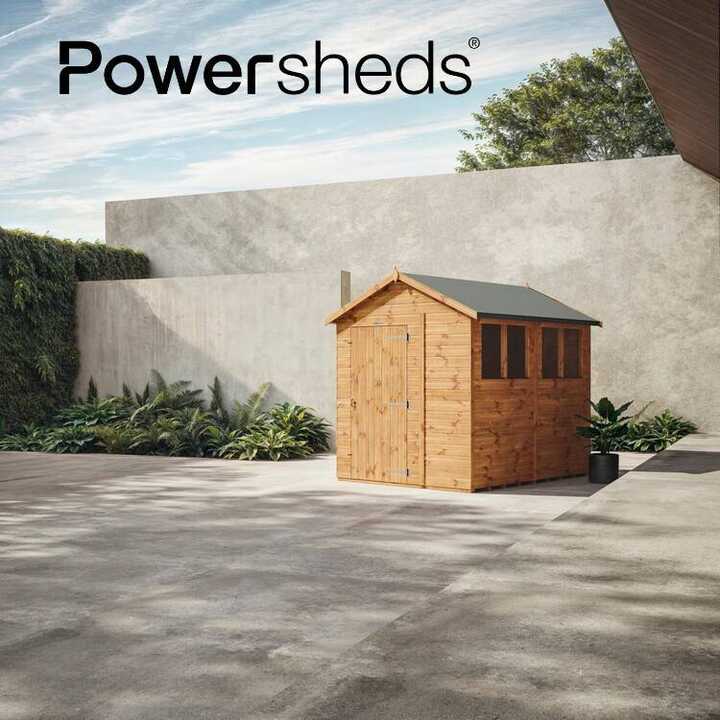 Apex Powershed stands alone in a landscaped outdoor area with a modern wall in the background.