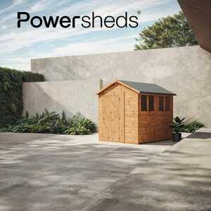 Apex Powershed stands alone in a landscaped outdoor area with a modern wall in the background.