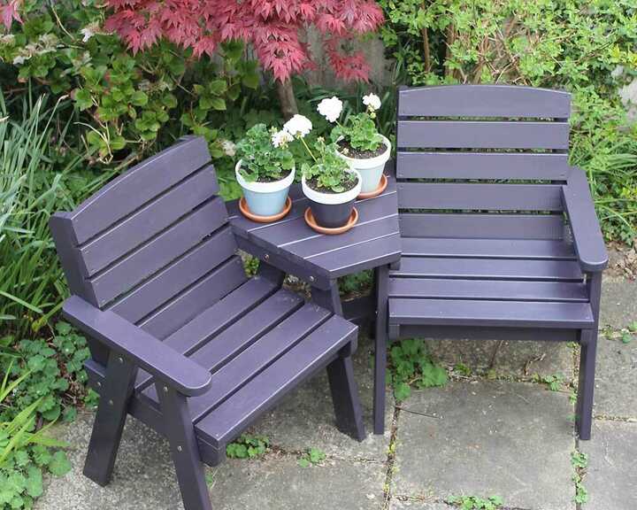 Two wooden chairs with a small table painted in Thorndown wood paint 
